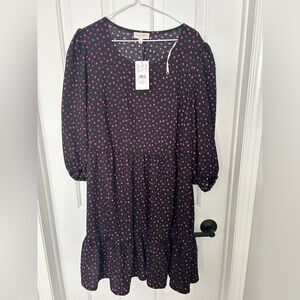 Long sleeved baby doll dress.